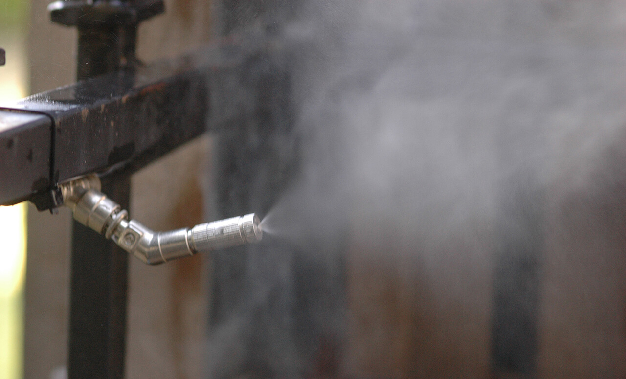 Close up of a MistAway mosquito misting nozzle installed by Natural Concepts